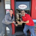 Sarah and Andres at Riveter's front door.